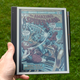 The Bigme InkNote color displaying a comic book cover under daylight.